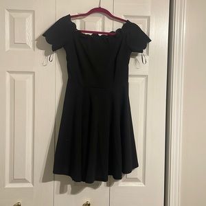 Little black dress. Scalloped neck line